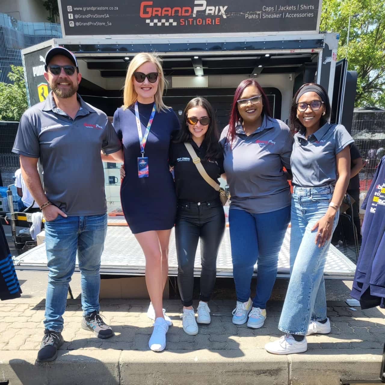 The friendly staff at the Grand Prix stall
